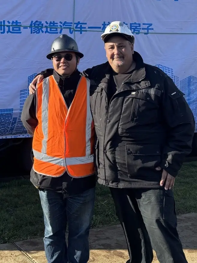 Combination Cranes owner roy with Customer on site - Cropped